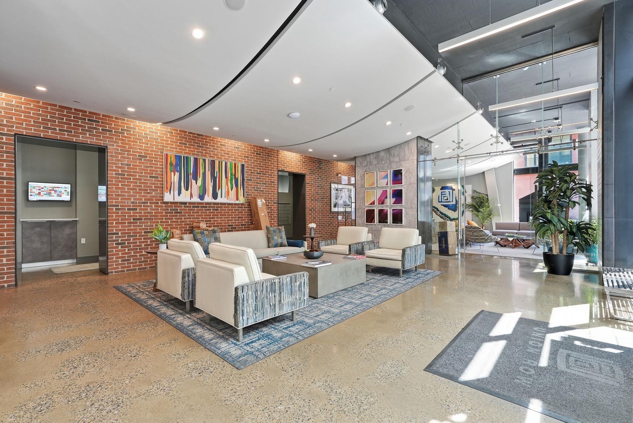 2125 14th Street Northwest, Unit 230 Washington, DC 20009 - Photo 19 of 20 Modern lobby with vibrant art.