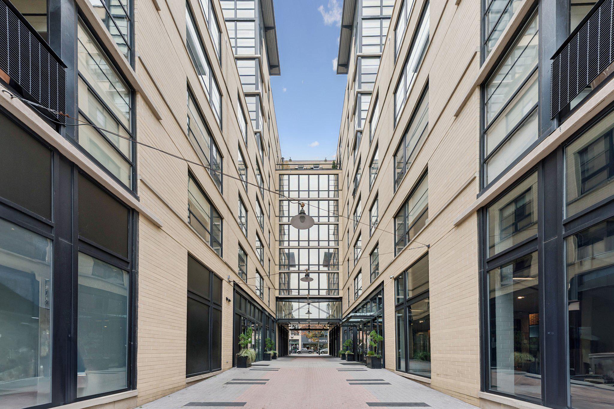 2125 14th Street Northwest, Unit 230 Washington, DC 20009 - Photo 20 of 20 Modern urban passageway of glass and brick.