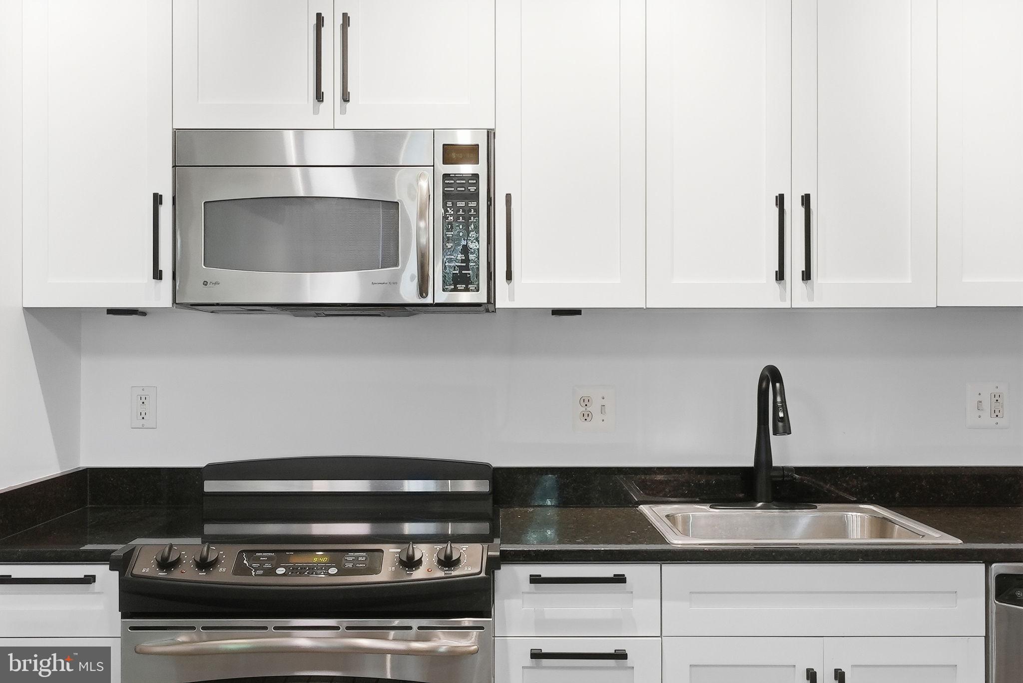 2125 14th Street Northwest, Unit 230 Washington, DC 20009 - Photo 6 of 20 Sleek modern kitchen elegance.