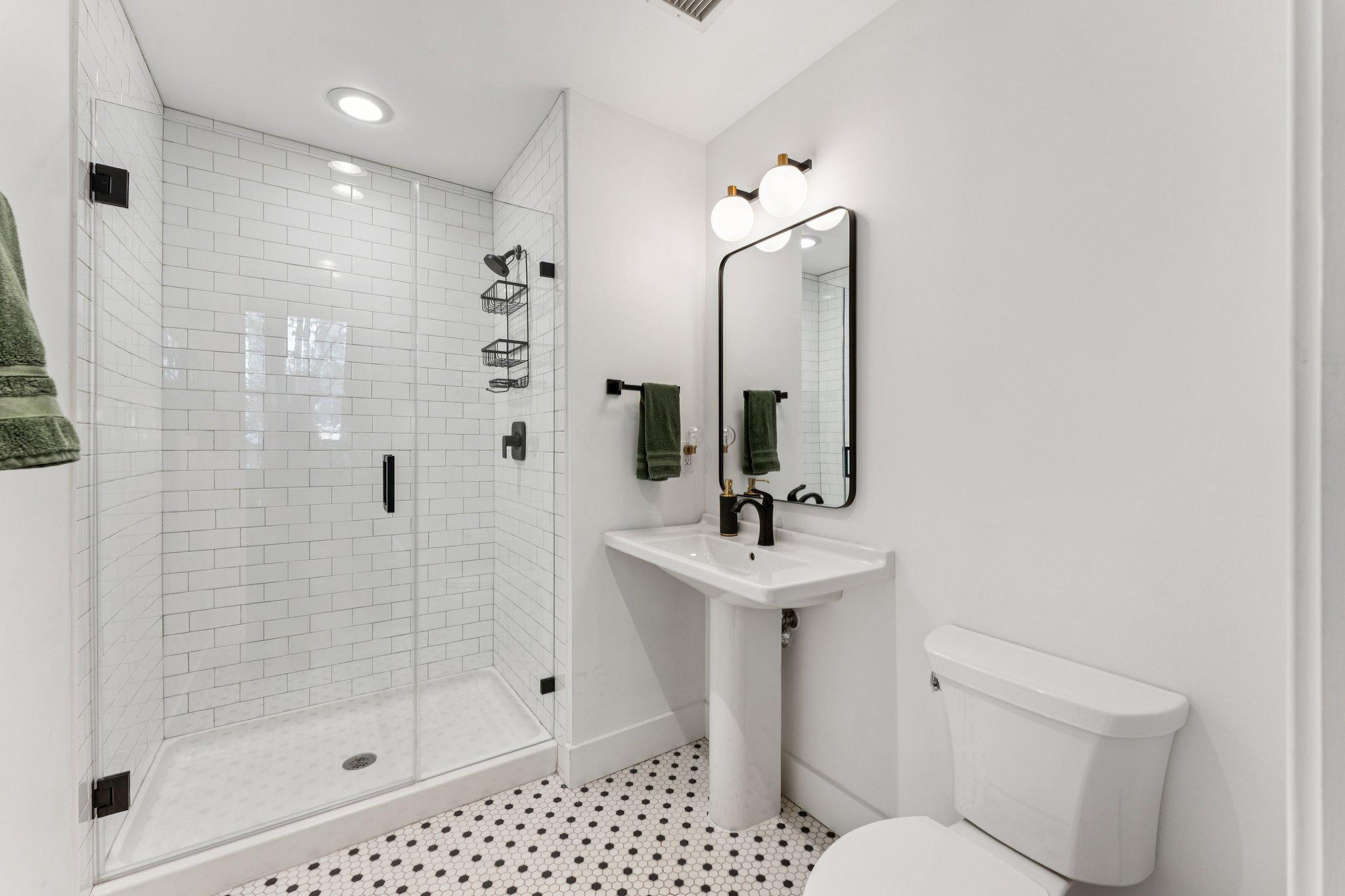 2125 14th Street Northwest, Unit 230 Washington, DC 20009 - Photo 10 of 20 Sleek modern bathroom with elegant tiles.