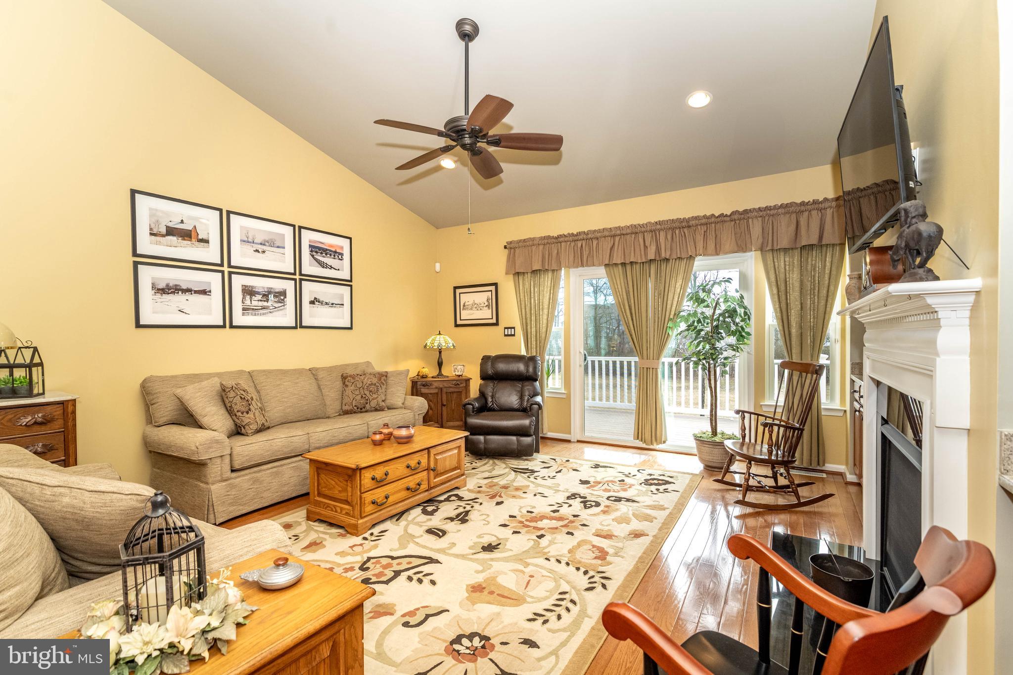 9 Alcott Way Marlton, NJ 08053 - Photo 16 of 51 a living room with furniture fireplace and flat screen tv
