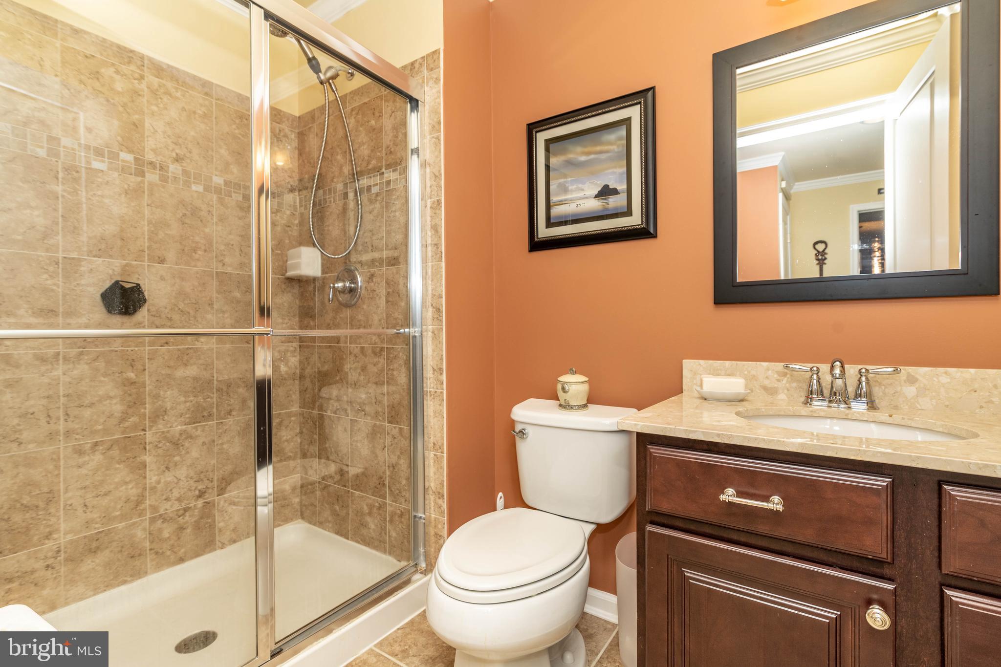 9 Alcott Way Marlton, NJ 08053 - Photo 42 of 51 a bathroom with a granite countertop toilet sink and shower