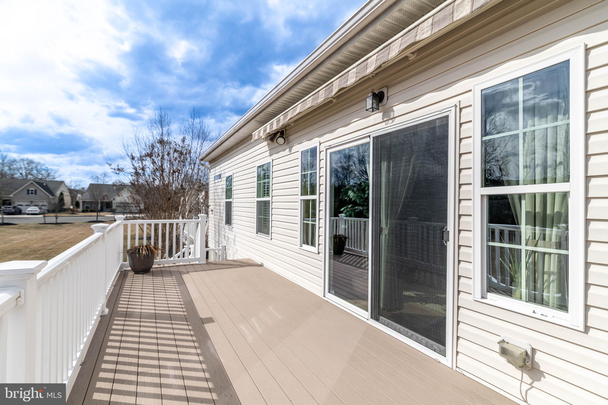 9 Alcott Way Marlton, NJ 08053 - Photo 50 of 51 a view of balcony with a large window and wooden floor