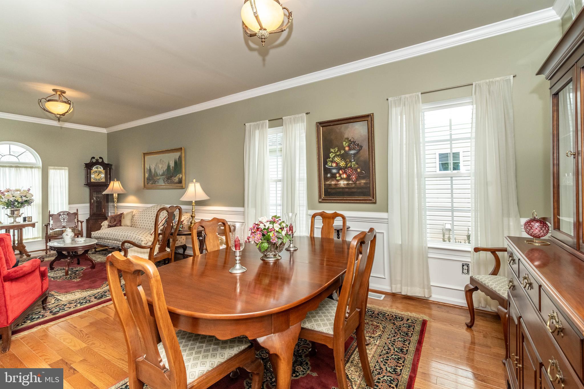 9 Alcott Way Marlton, NJ 08053 - Photo 8 of 51 a view of a dining room with furniture and a chandelier