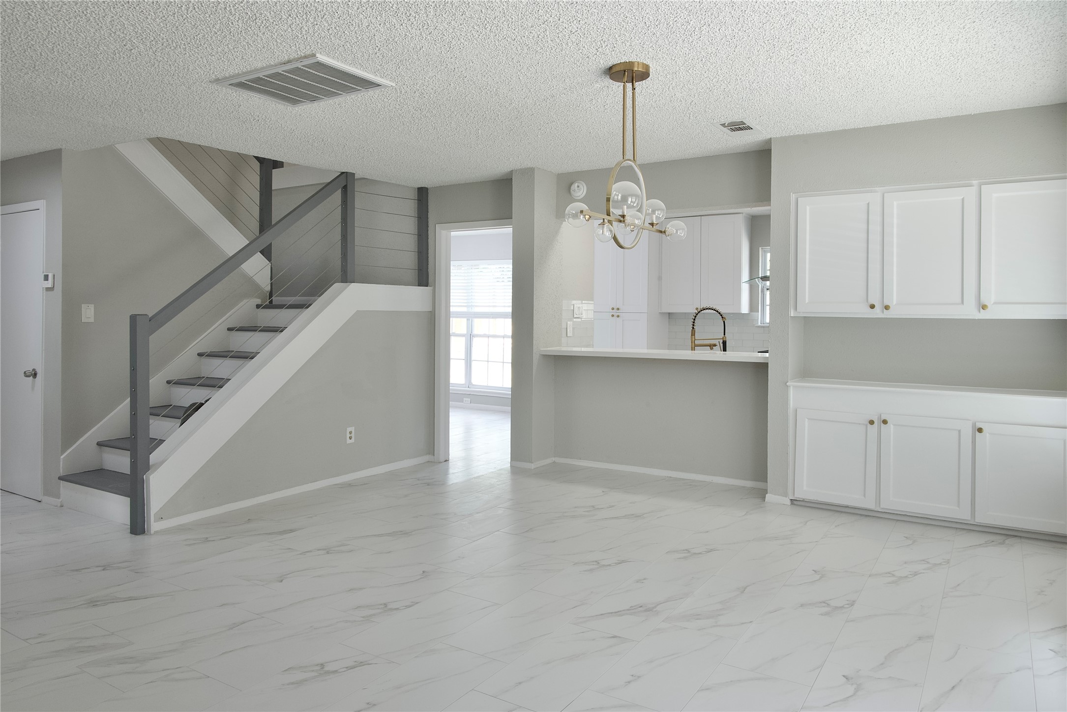 5111 Pinewilde Drive Houston, TX 77066 - Photo 12 of 37 a view of a kitchen cabinets and a window