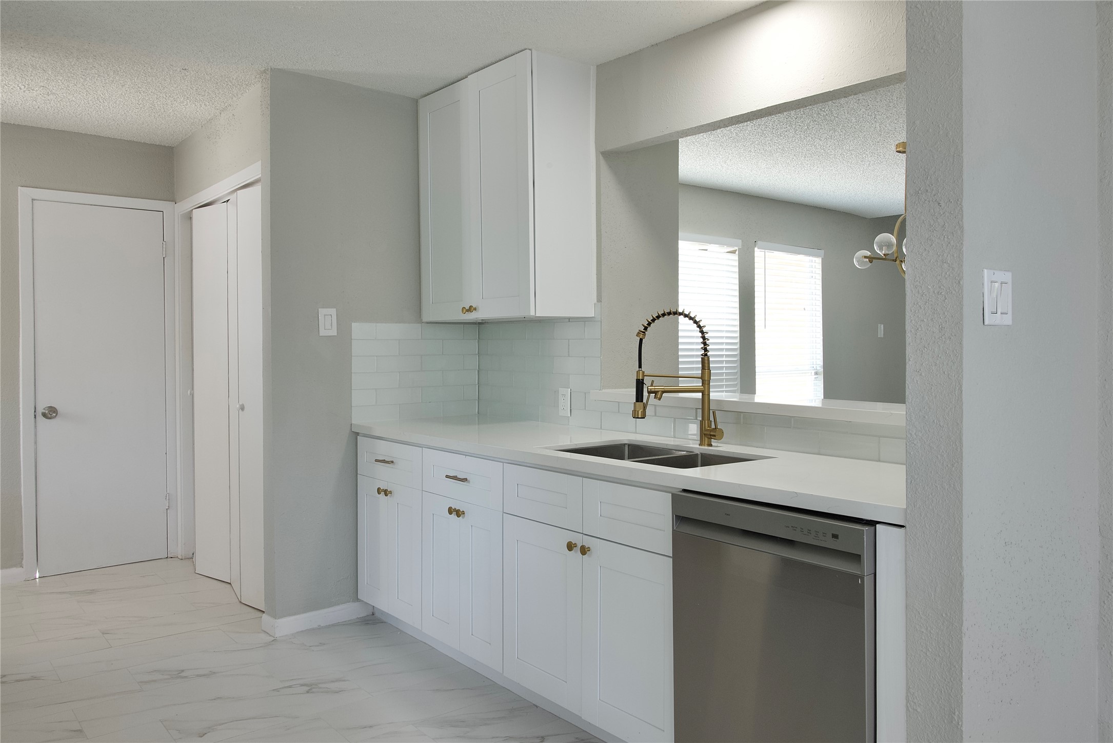 5111 Pinewilde Drive Houston, TX 77066 - Photo 15 of 37 a kitchen with a sink and cabinets
