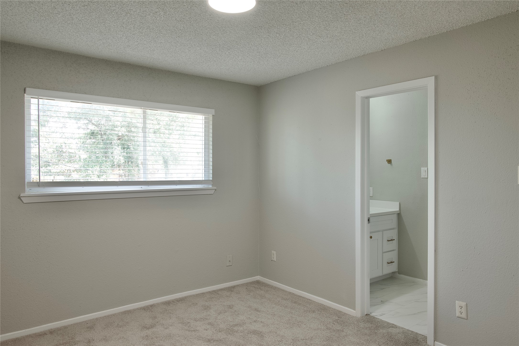 5111 Pinewilde Drive Houston, TX 77066 - Photo 28 of 37 an empty room and a window
