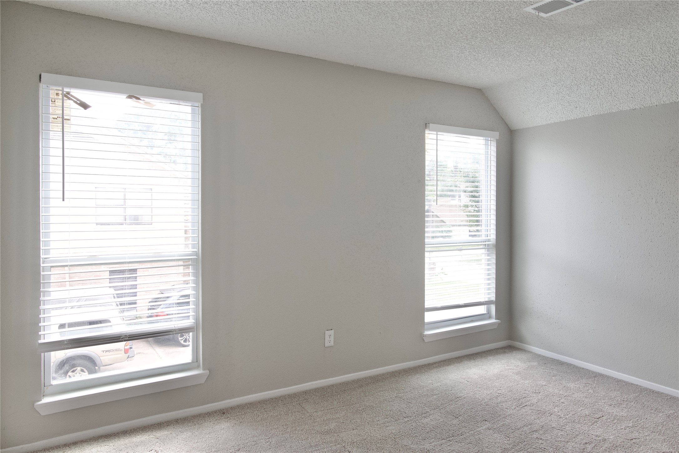 5111 Pinewilde Drive Houston, TX 77066 - Photo 32 of 37 a view of an empty room with a window