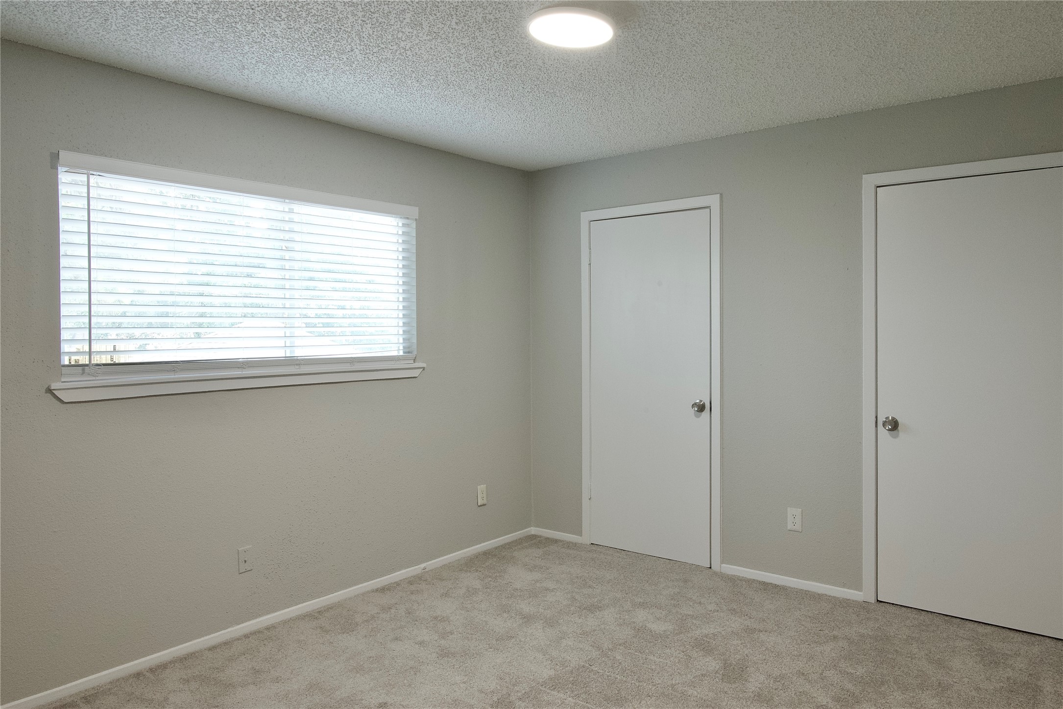 5111 Pinewilde Drive Houston, TX 77066 - Photo 34 of 37 an empty room with a window