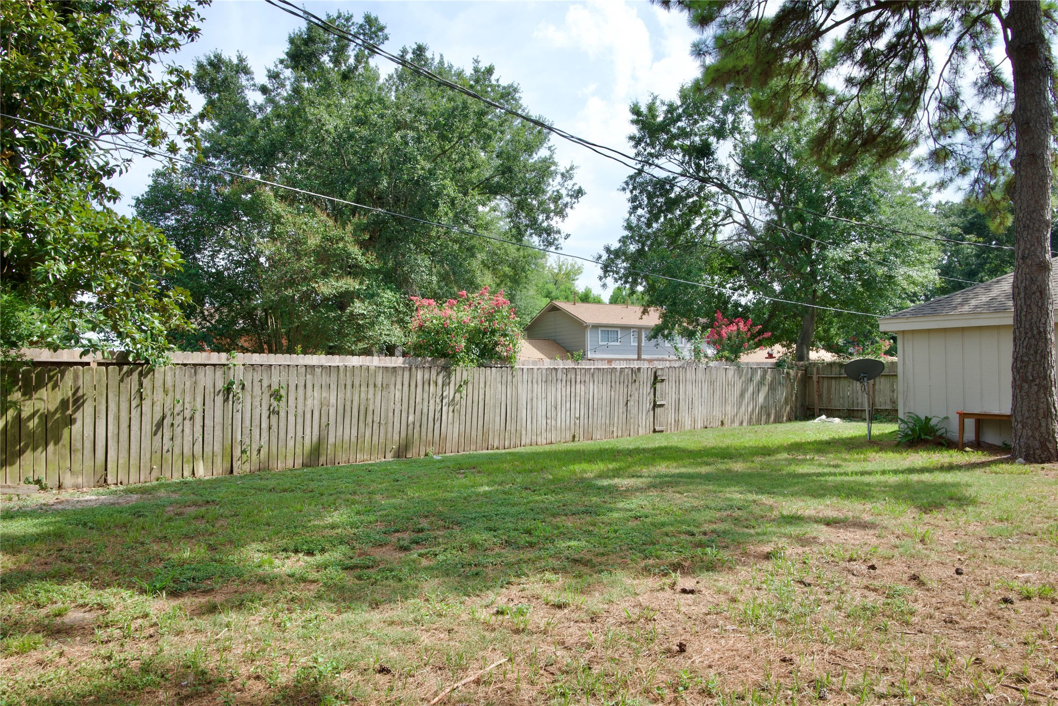 5111 Pinewilde Drive Houston, TX 77066 - Photo 36 of 37 a view of backyard with wooden fence