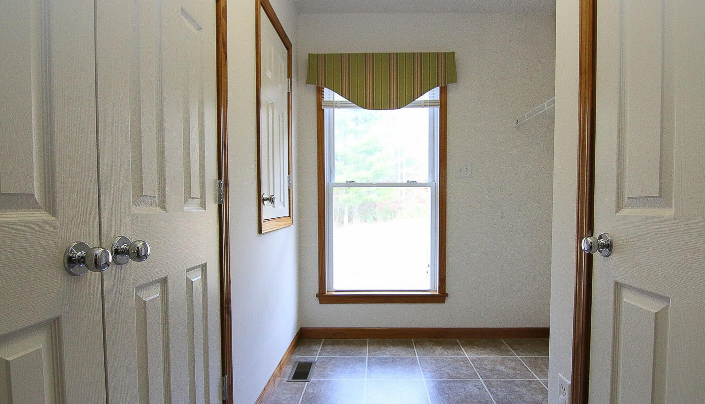 860 Beech Mountain Road Ferrum, VA 24088 - Photo 18 of 48 a view of an empty room with a window