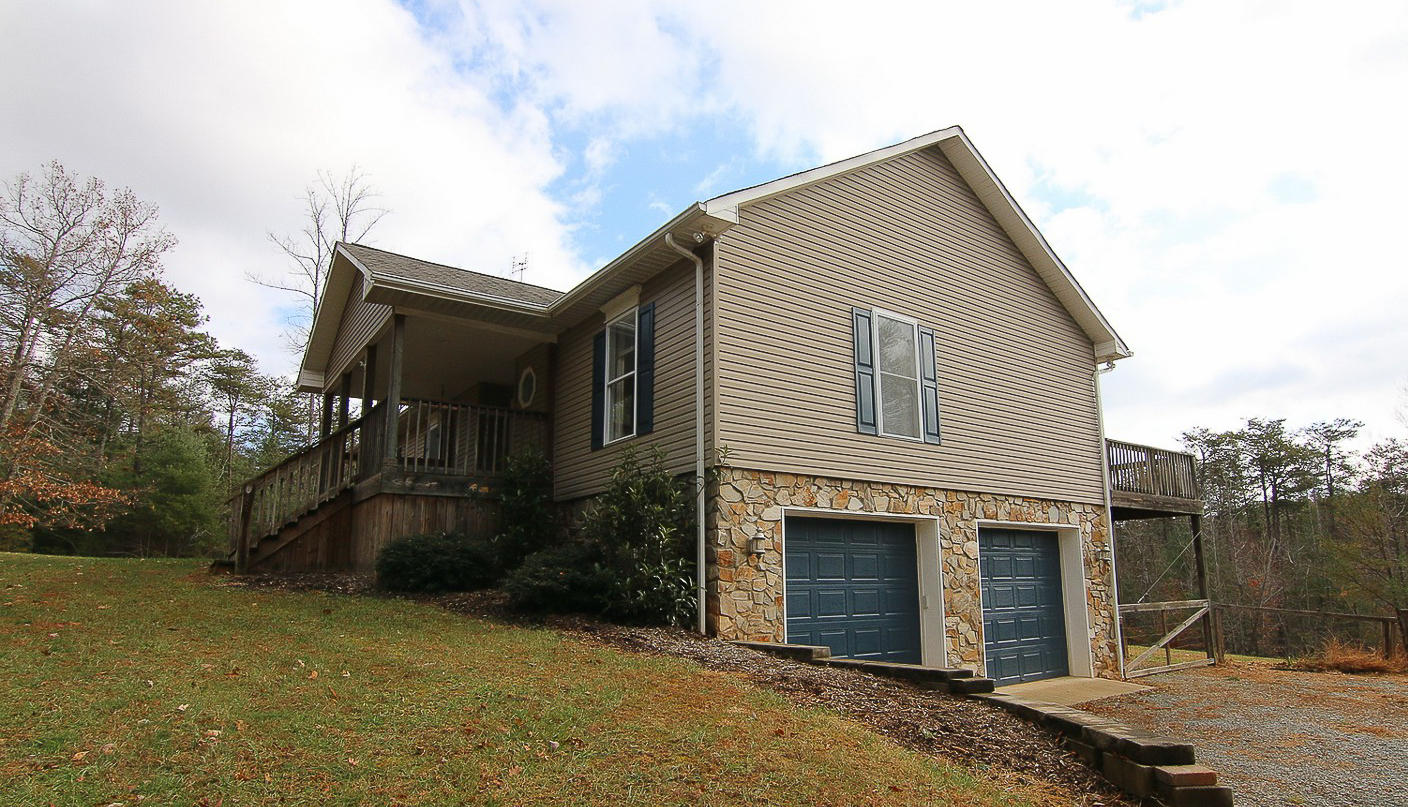 860 Beech Mountain Road Ferrum, VA 24088 - Photo 2 of 48 a front view of house with pathway