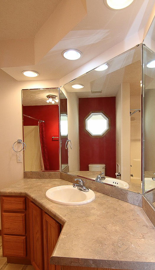 860 Beech Mountain Road Ferrum, VA 24088 - Photo 29 of 48 a bathroom with a sink and a mirror