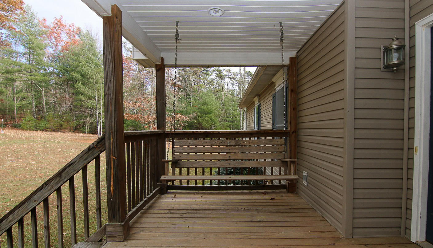 860 Beech Mountain Road Ferrum, VA 24088 - Photo 3 of 48 a view of a balcony with wooden floor