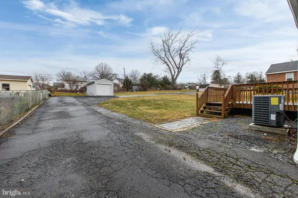 a view of a yard with an outdoor space