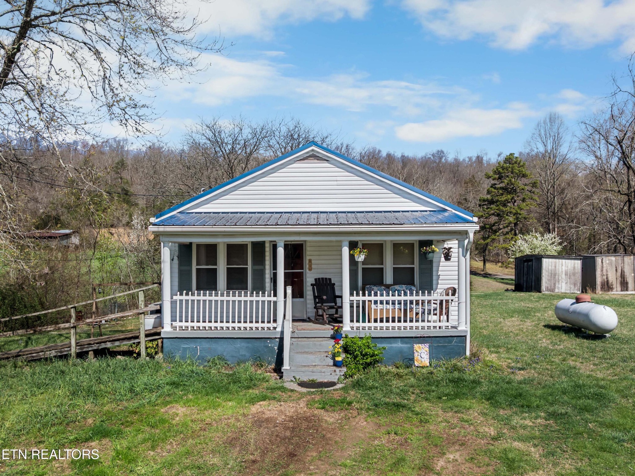 385 Hubbs Grove Road Maynardville, TN 37807 - Photo 19 of 33 a front view of a house with a garden