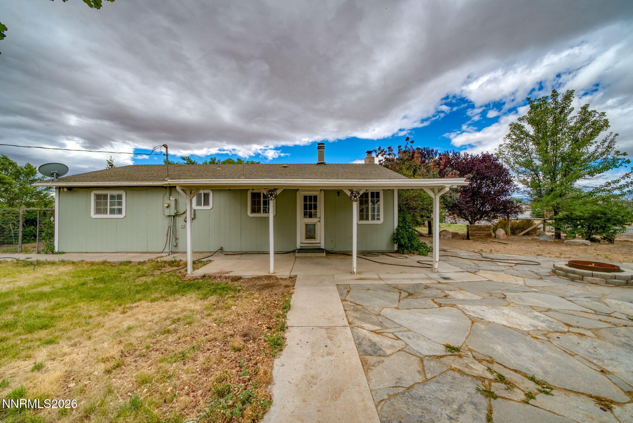 11577 Deodar Way Reno, NV 89506 - Photo 51 of 58 a view of a house with a yard