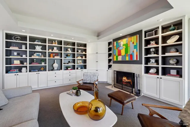 a workspace with wooden floor and a window
