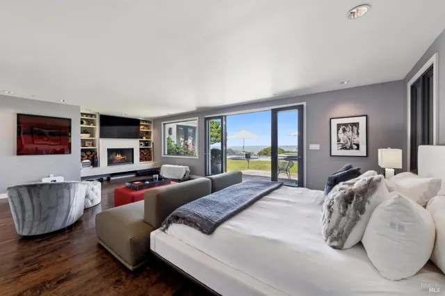 a spacious bathroom with a bathtub and a sink