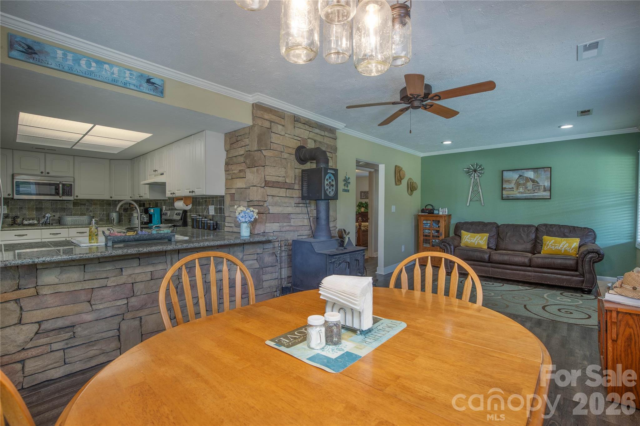 84 Sheets Farm Road Bakersville, NC 28705 - Photo 10 of 42 a view of a dining room with furniture