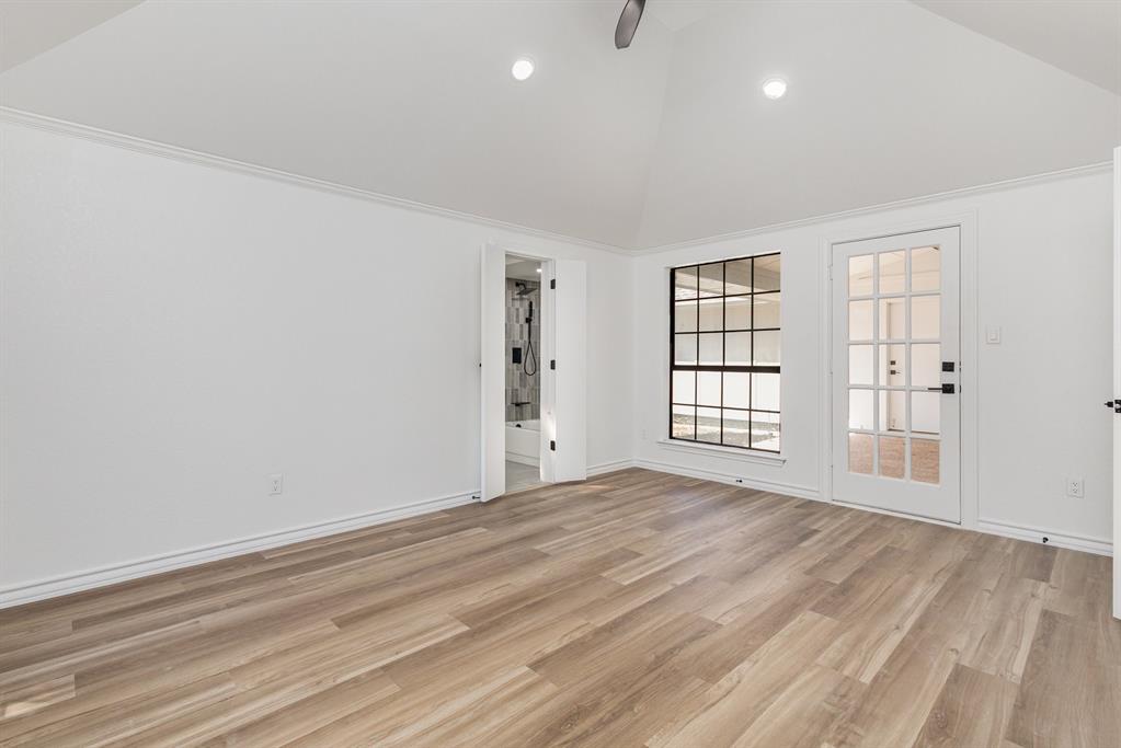 922 Sycamore Creek Road Allen, TX 75002 - Photo 21 of 38 Spare room featuring light wood-style floors, recessed lighting, and high vaulted ceiling