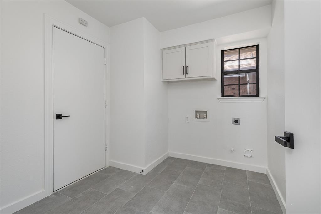 922 Sycamore Creek Road Allen, TX 75002 - Photo 29 of 38 Laundry area with washer hookup, hookup for an electric dryer, gas dryer hookup, and cabinet space