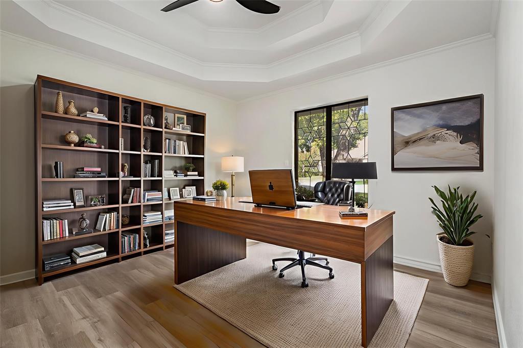 922 Sycamore Creek Road Allen, TX 75002 - Photo 8 of 38 Home office with a raised ceiling, light wood finished floors, and crown molding