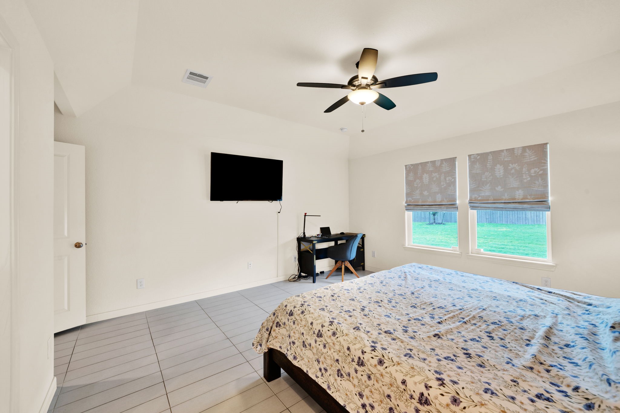 2503 Hagerman Road Conroe, TX 77384 - Photo 18 of 43 Spacious Primary bedroom features a modern design