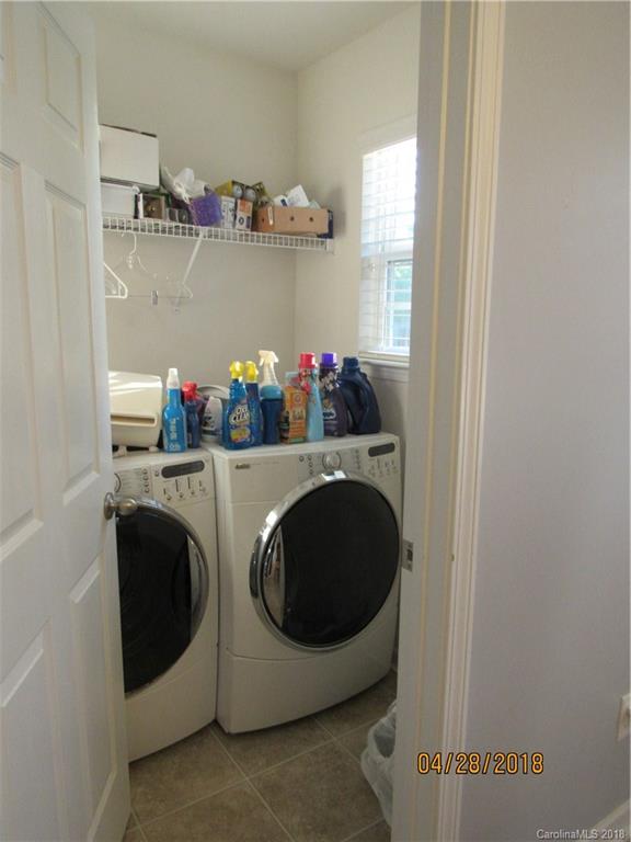 7606 West Berkeley Road Denver, NC 28037 - Photo 7 of 22 a utility room with dryer and washer