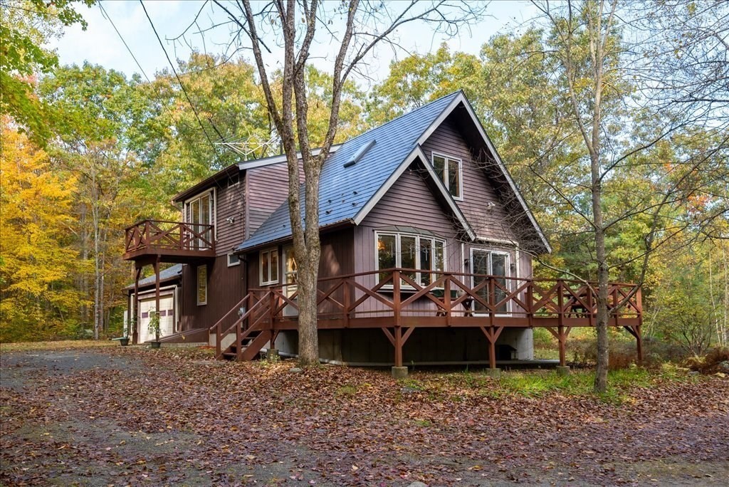 2172 Greenwich Road Hardwick, MA 01082 - Photo 1 of 42 a front view of a house with a yard