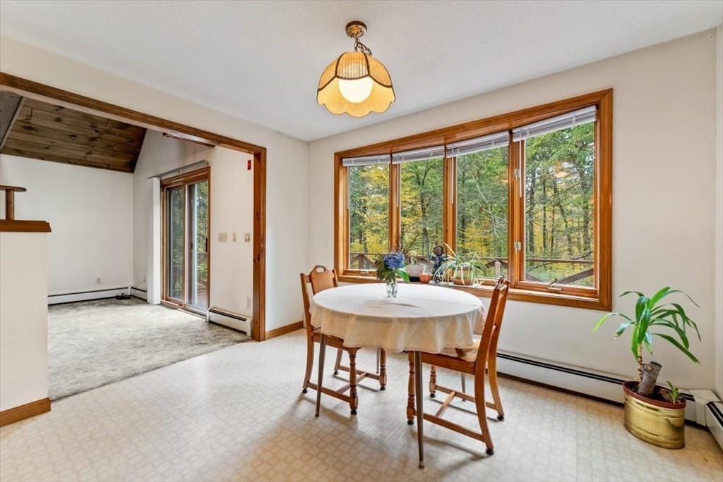 2172 Greenwich Road Hardwick, MA 01082 - Photo 11 of 42 a view of a dining room with furniture window and outside view
