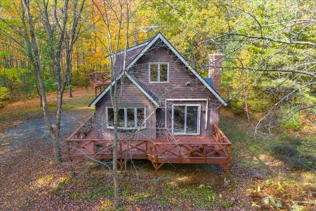2172 Greenwich Road Hardwick, MA 01082 - Photo 2 of 42 a aerial view of a house with swimming pool next to a yard