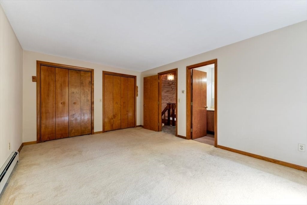 2172 Greenwich Road Hardwick, MA 01082 - Photo 21 of 42 a view of an empty room with closet and a window