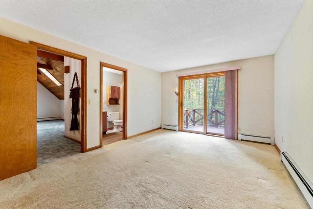 2172 Greenwich Road Hardwick, MA 01082 - Photo 24 of 42 an empty room with windows and closet