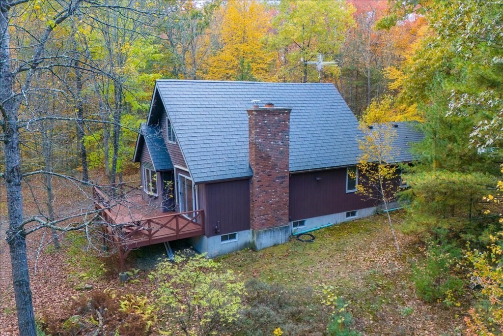 2172 Greenwich Road Hardwick, MA 01082 - Photo 36 of 42 a backyard of a house with barbeque oven table and chairs