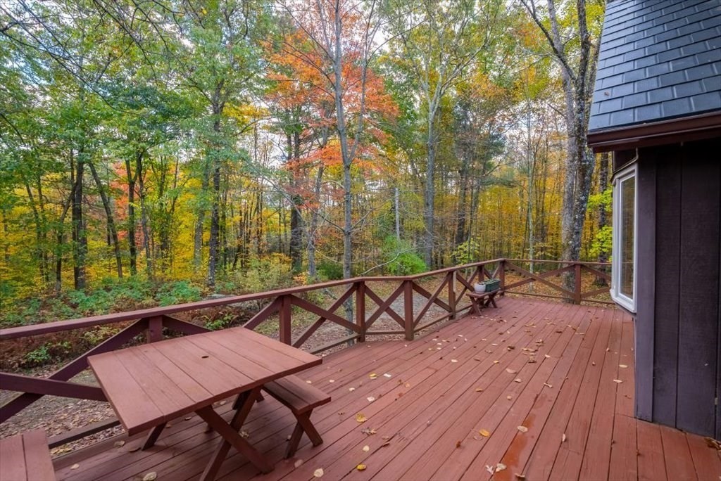 2172 Greenwich Road Hardwick, MA 01082 - Photo 4 of 42 a view of a wooden deck with a bench