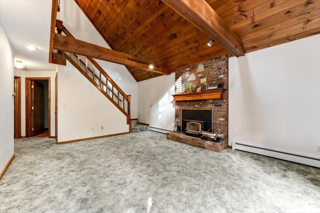 2172 Greenwich Road Hardwick, MA 01082 - Photo 9 of 42 a view of an empty room with a fireplace
