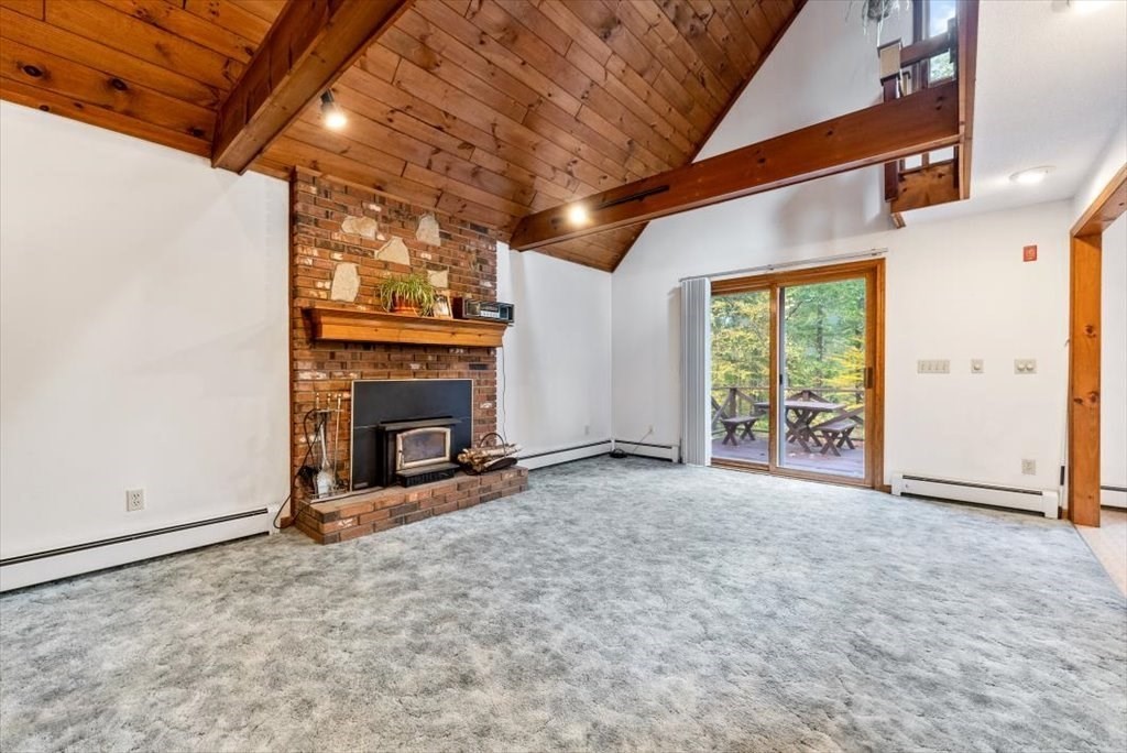 2172 Greenwich Road Hardwick, MA 01082 - Photo 10 of 42 a view of an empty room with a fireplace
