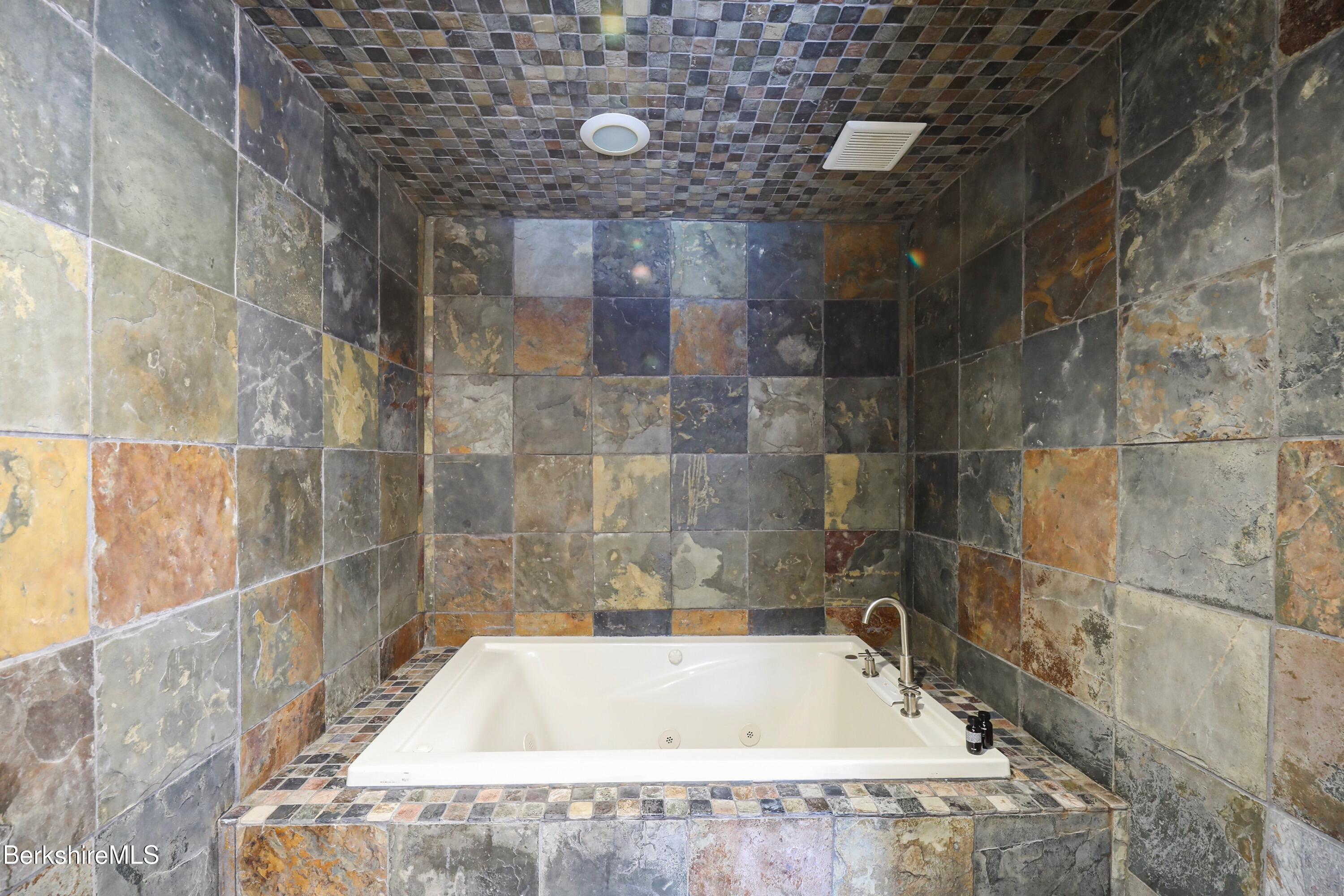 1 Devon Road Stockbridge, MA 01262 - Photo 19 of 58 a bathroom with a bathtub and shower