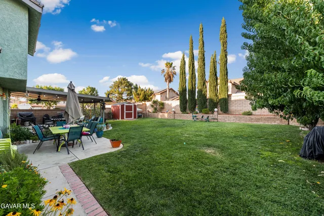 a view of a lobby with a garden and plants