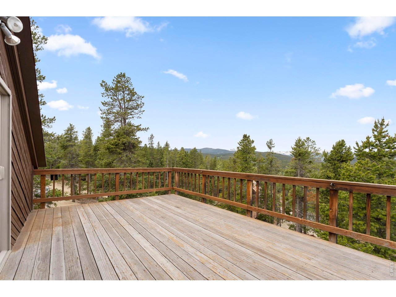 109 Cutforth Road Black Hawk, CO 80422 - Photo 17 of 40 Upper level deck with new glass sliders
