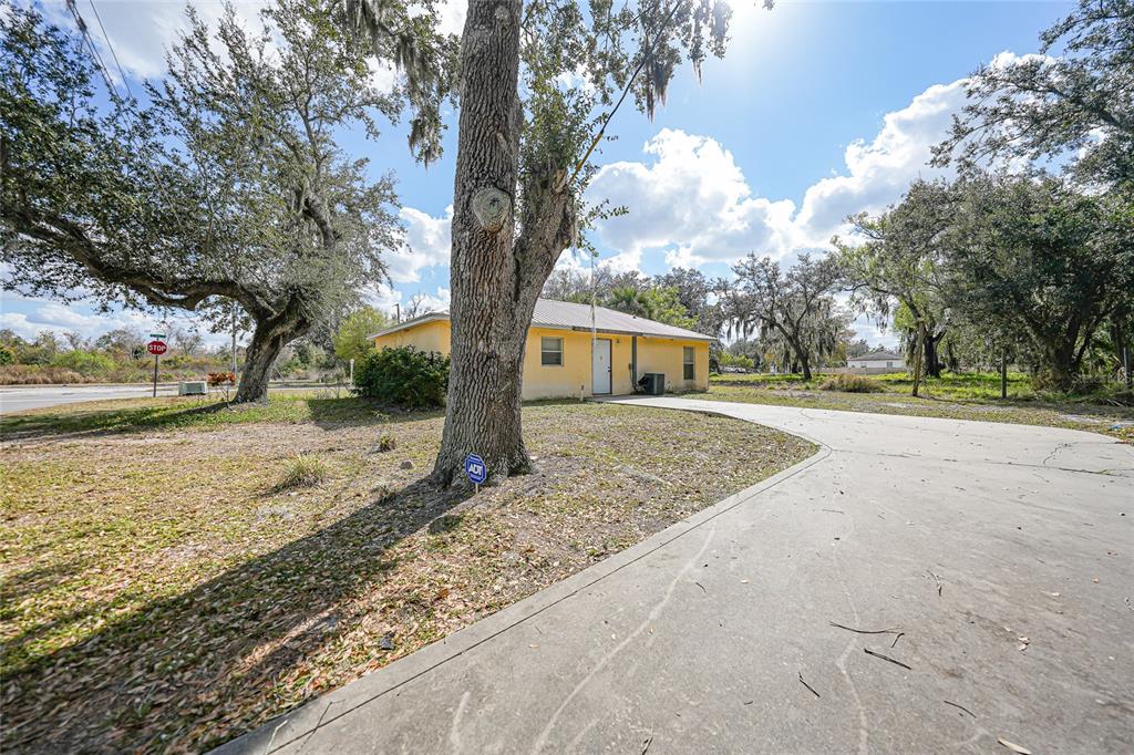 3 West Myrtle Street Arcadia, FL 34266 - Photo 25 of 41 a view of a yard with wooden fence
