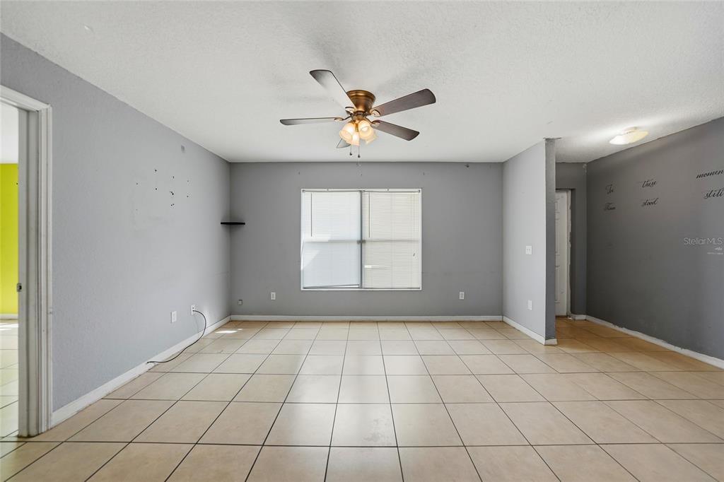 3 West Myrtle Street Arcadia, FL 34266 - Photo 4 of 41 a view of an empty room with a window