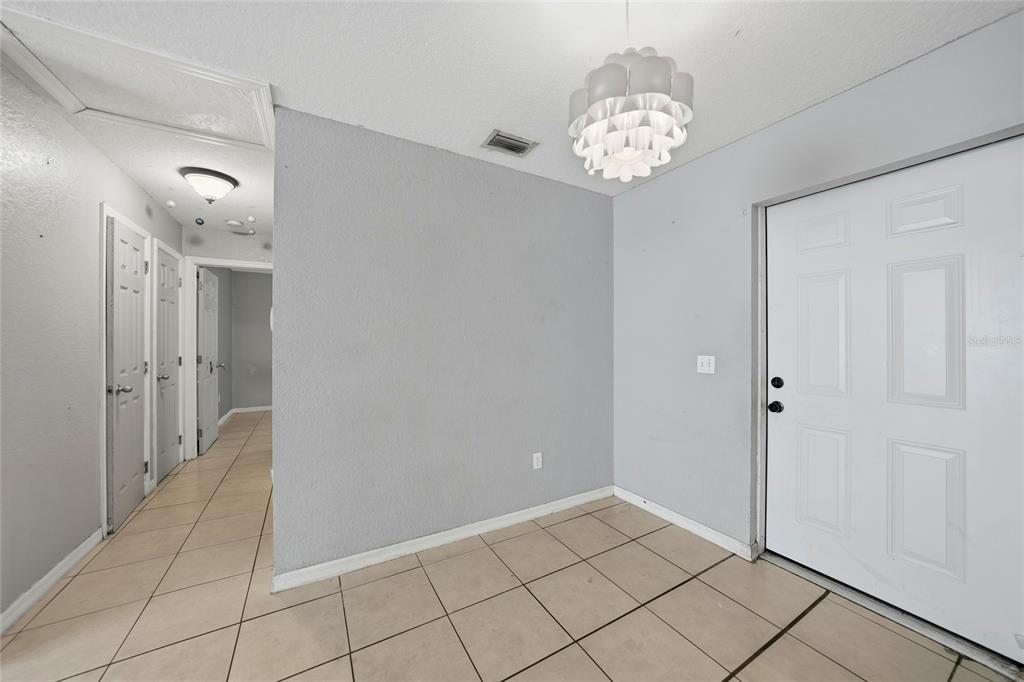 3 West Myrtle Street Arcadia, FL 34266 - Photo 6 of 41 a view of a chandelier in a room