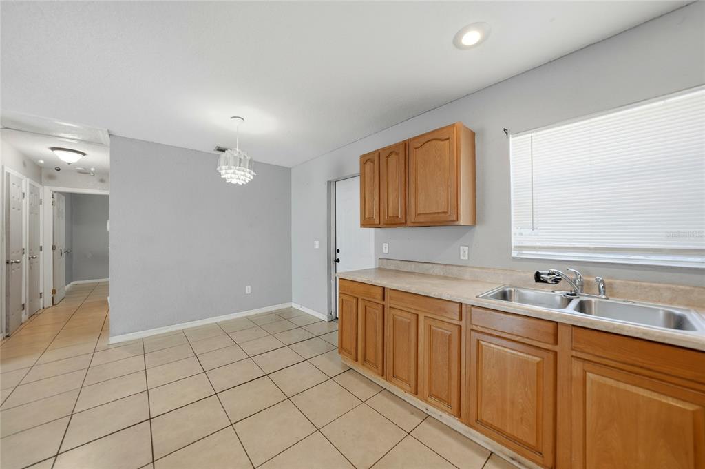 3 West Myrtle Street Arcadia, FL 34266 - Photo 10 of 41 a bathroom with a sink a toilet and mirror