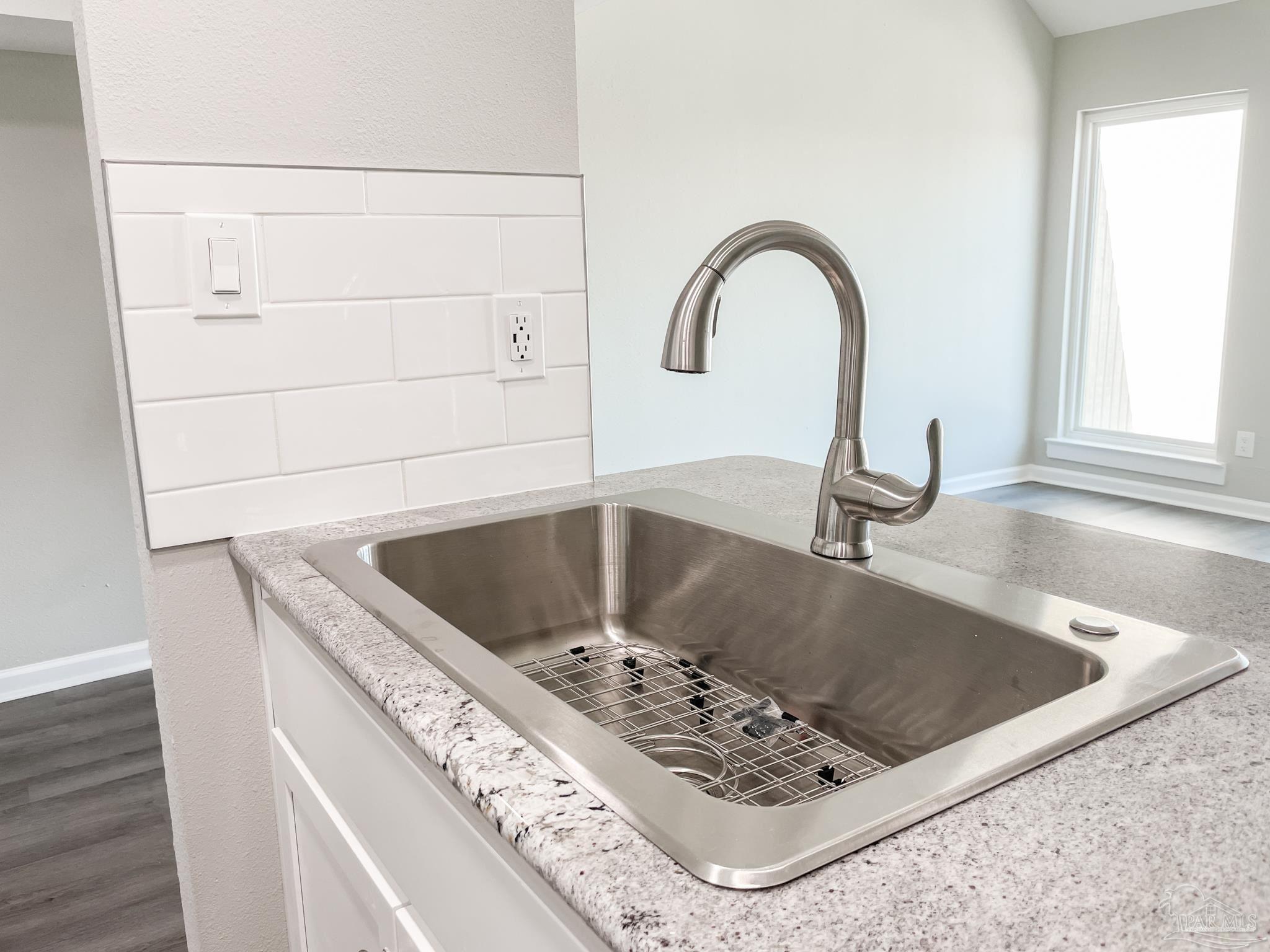 7200 Sharp Reef, Unit 2 Pensacola, FL 32507 - Photo 12 of 24 a close view of sink and tap