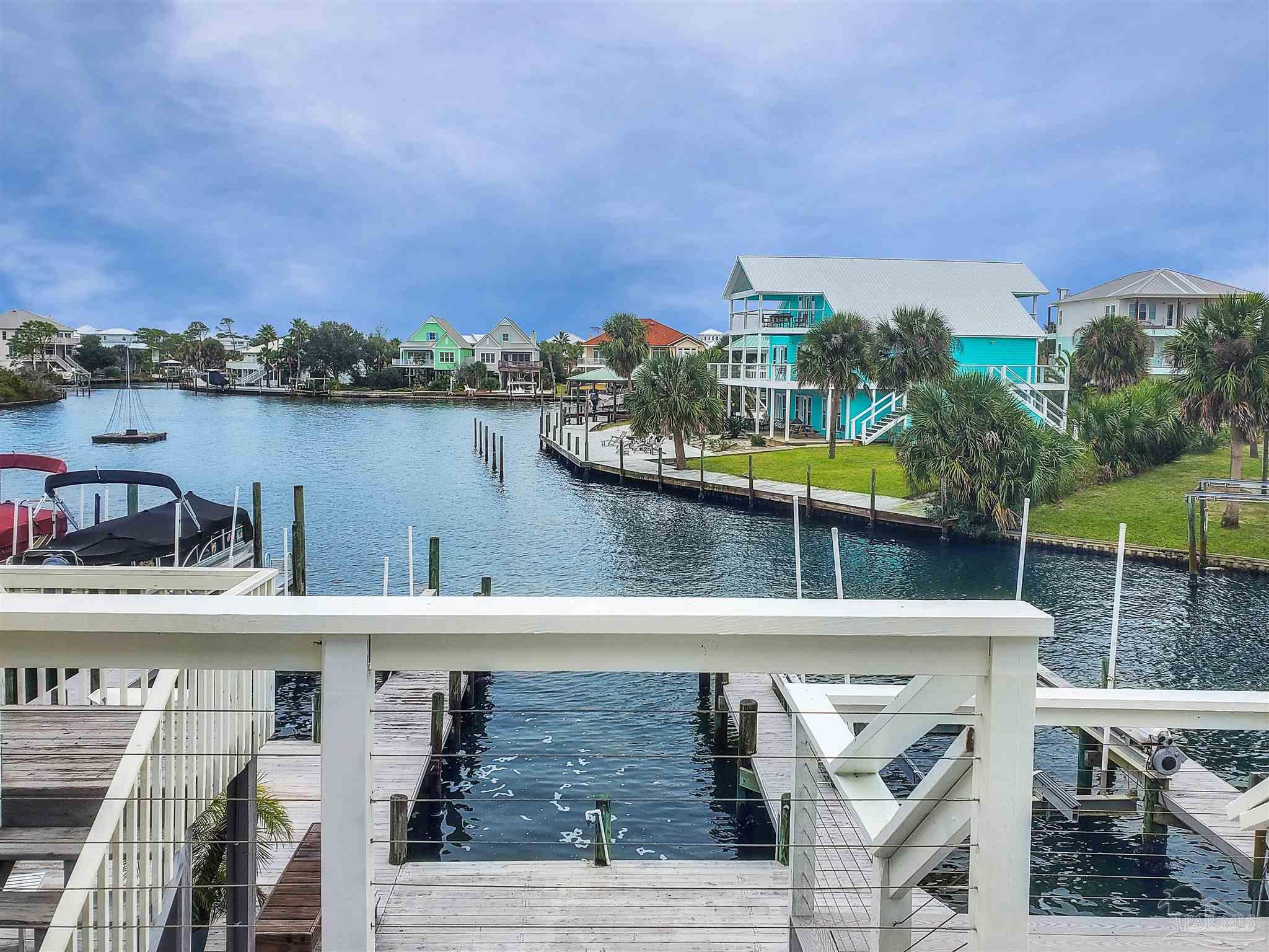 7200 Sharp Reef, Unit 2 Pensacola, FL 32507 - Photo 3 of 24 a view of a lake