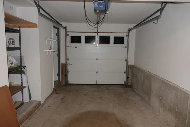 a view of a house with a garage