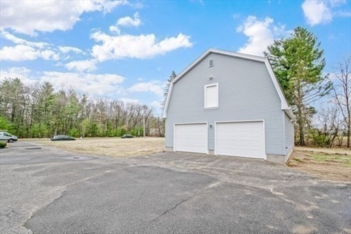 1307 Burnett Road Chicopee, MA 01020 - Photo 33 of 41 a view of garage and yard