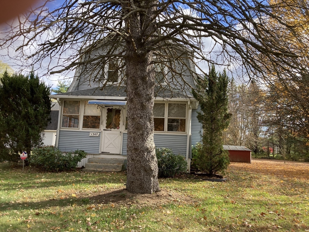 1307 Burnett Road Chicopee, MA 01020 - Photo 36 of 41 a view of a house with a yard